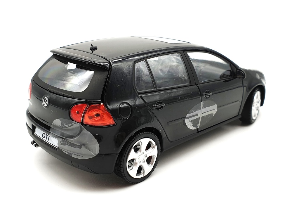 Volkswagen Golf GTi serie 5 (2003) Cararama 125077 1/24 