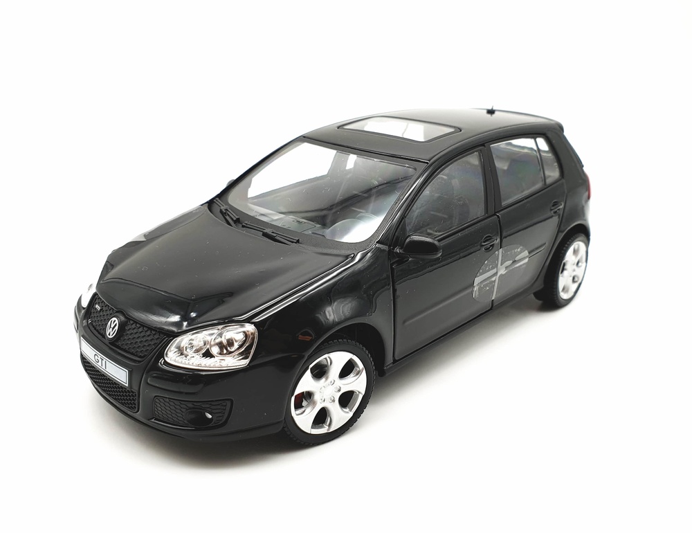 Volkswagen Golf GTi serie 5 (2003) Cararama 125077 1/24 